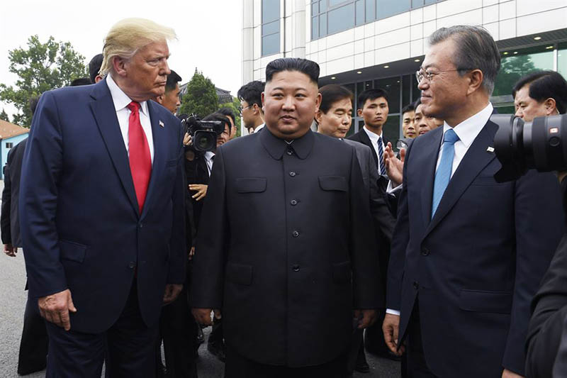 Trump, Kim and Moon have historic meeting at DMZ
